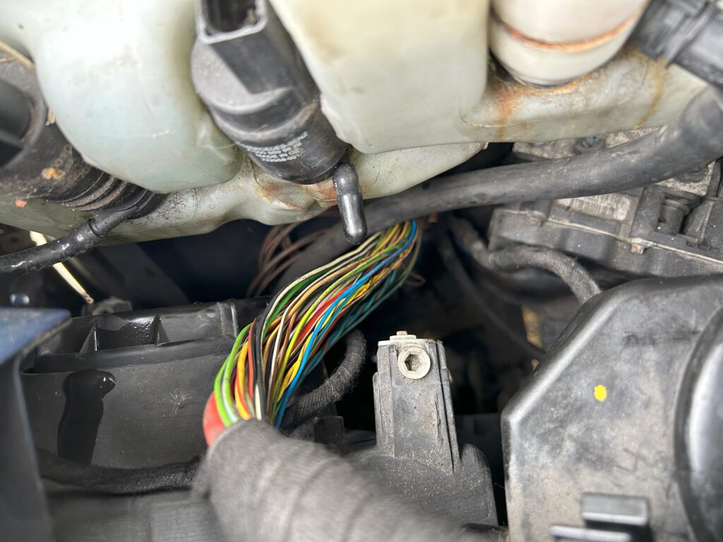 Vehicle wiring tidy and repair by an auto electrician.